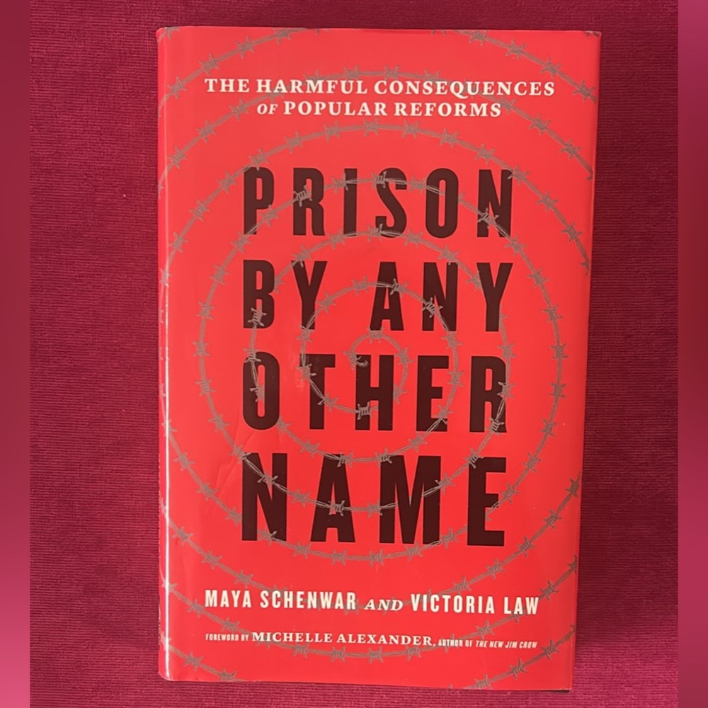 Prison By Any Other Name — Red Hardcover Book